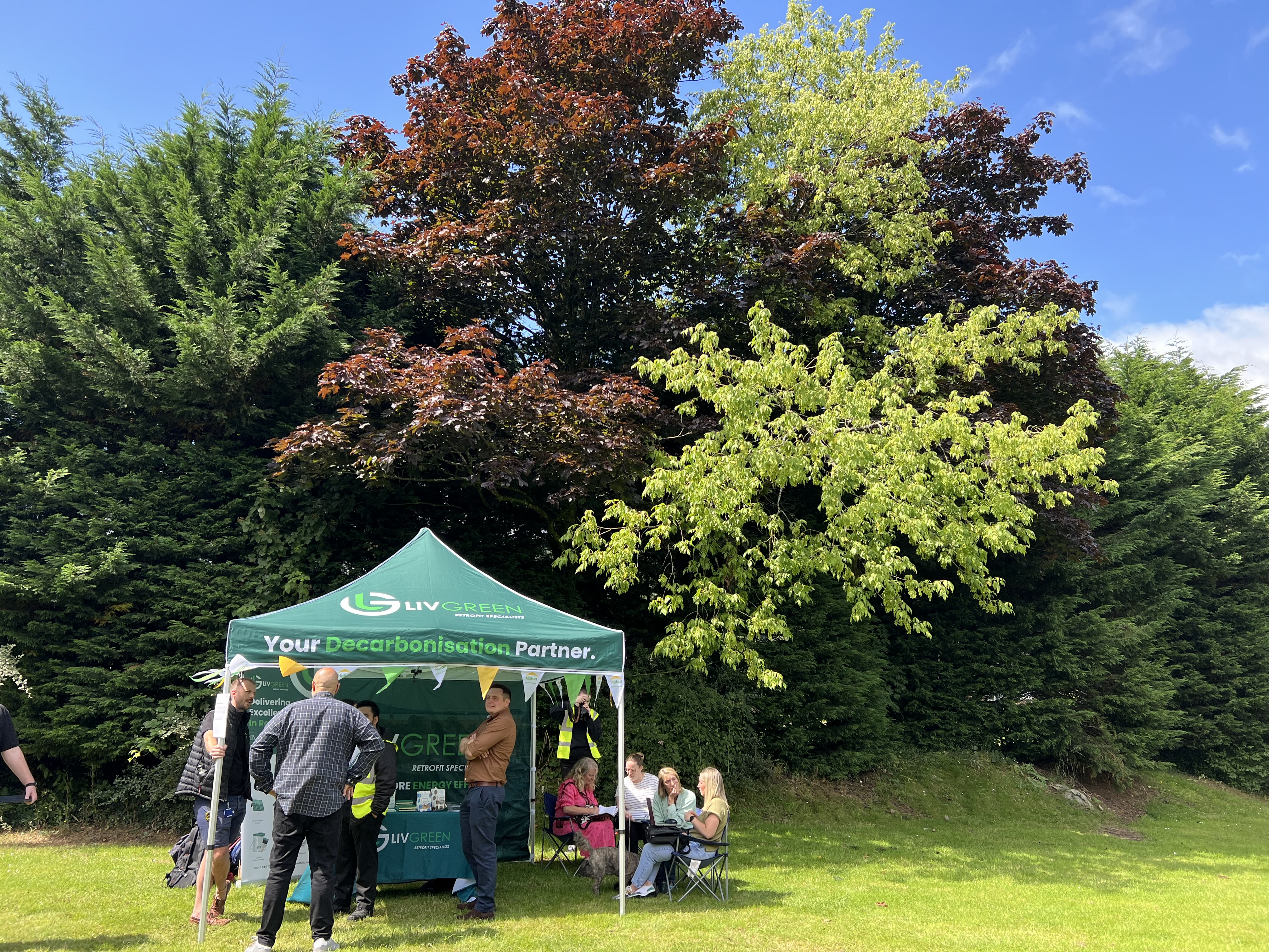 Footprint Programme engagement day, people talking underneath a gazebo