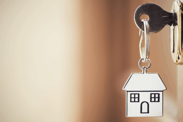 House keyring on a key in a lock